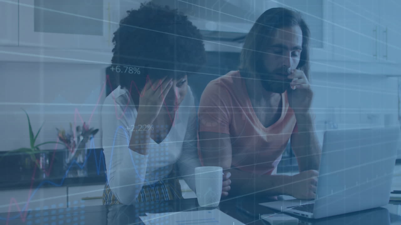 Animation of graphs with changing numbers over stressed diverse couple looking at expenses in laptop
