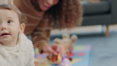 Happy,-baby-and-mother-playing-while-crawling