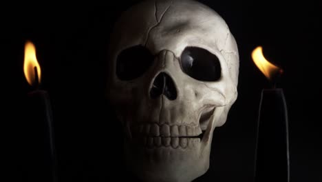 Time-lapse-of-human-skull-with-candles