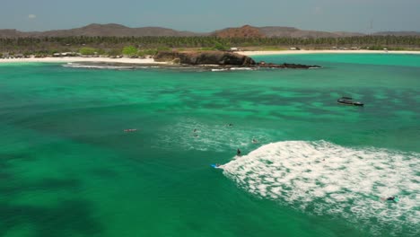 the white sand beach of tanjung aan in lombok, indonesia during a sunny day