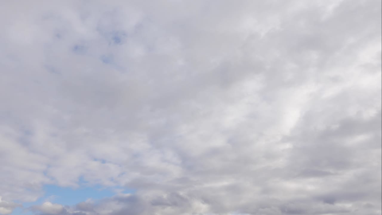 Blue sky white clouds. Puffy fluffy white clouds. Cumulus cloud scape timelapse. Summer blue sky time lapse. Dramatic majestic amazing blue sky. Soft white clouds form. Clouds time lapse background