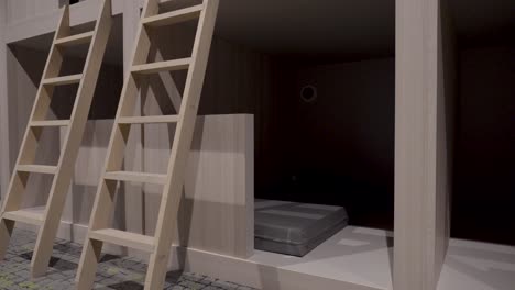 slow pull out shot of wooden ladders at the side of a bunk bed