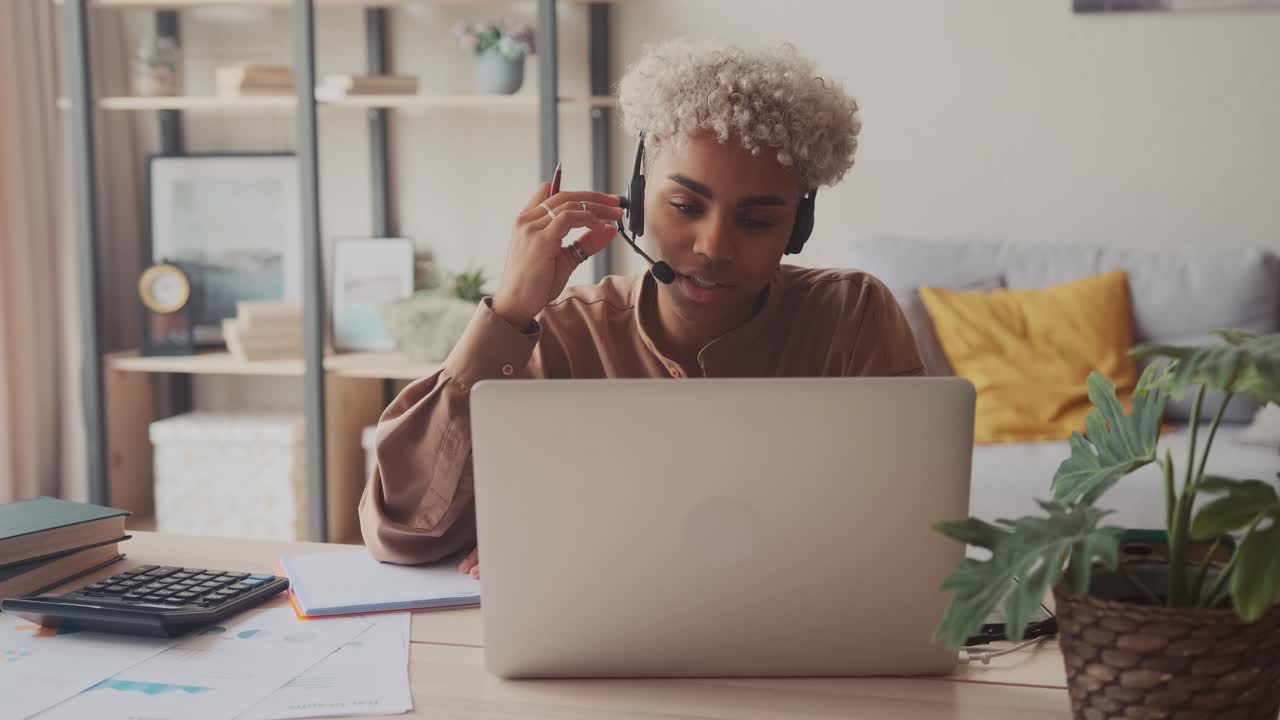 Woman having a video conference at home