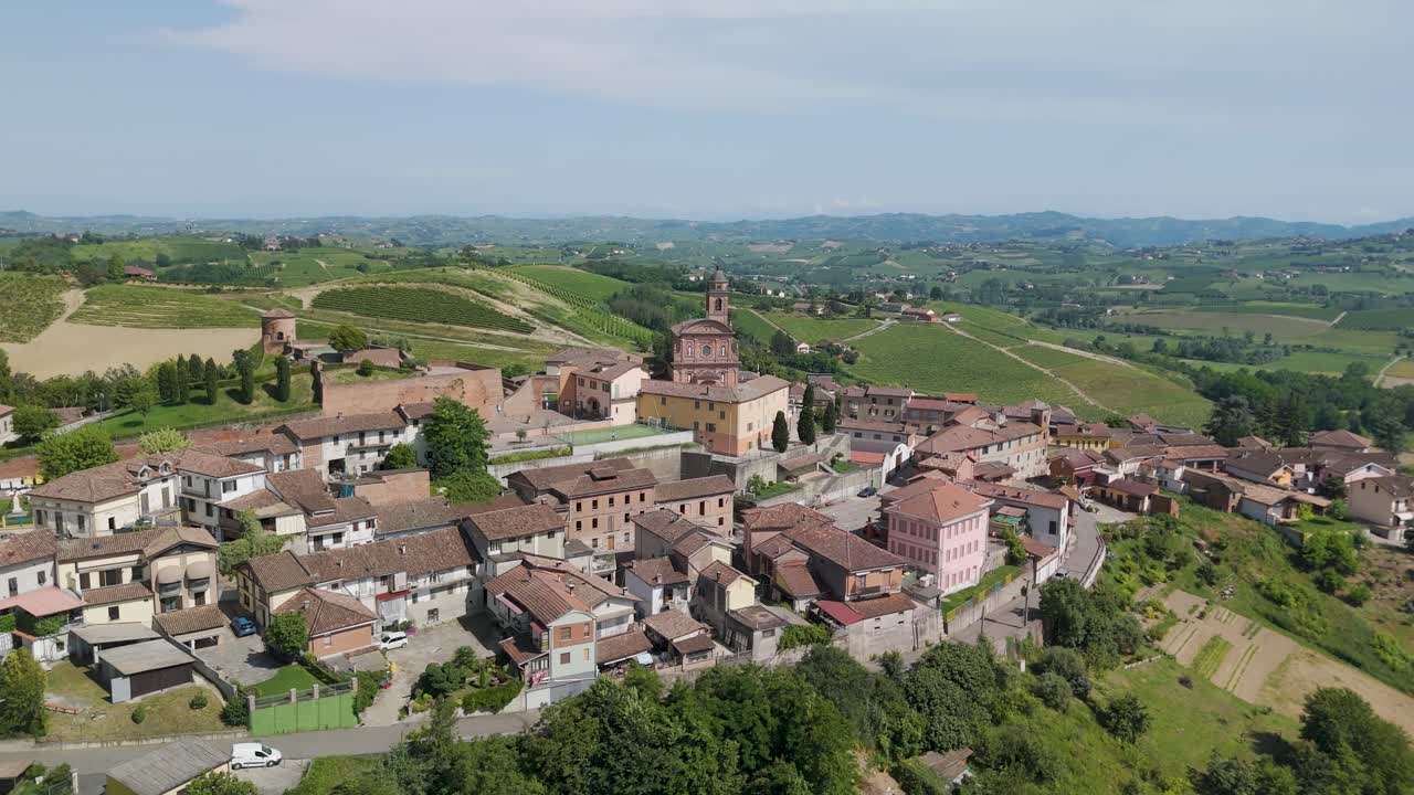 Castelnuovo Calcea, Monferrato region, Asti, Piedmont, Italy. 4k aerial view of the city. Langhe-Roero and Monferrato. Flying forward above the city towards the church.