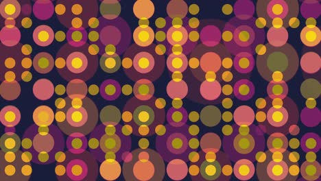 vibrant blinking dots and circles animation with colorful overlapping spheres in warm tones on dark background