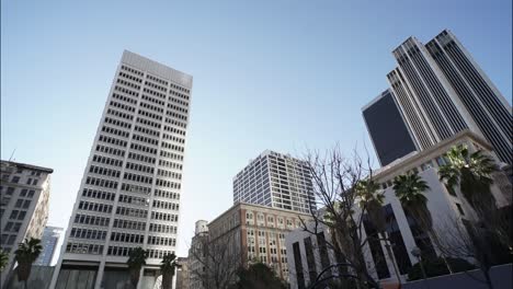 downtown los angeles streets. sunlight moves on tall buildings. la offices, hotels, apartments. american business city, modern urban tourism destination in usa.