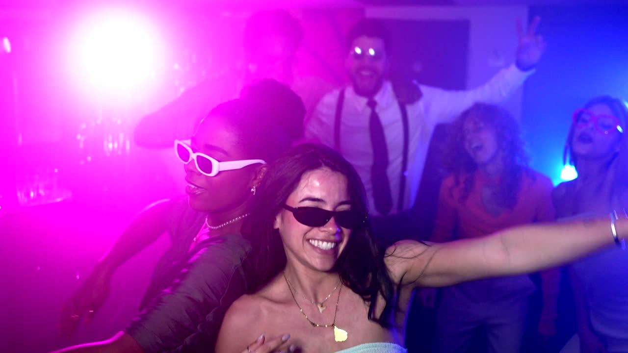 People Dancing and Celebrating at a Party