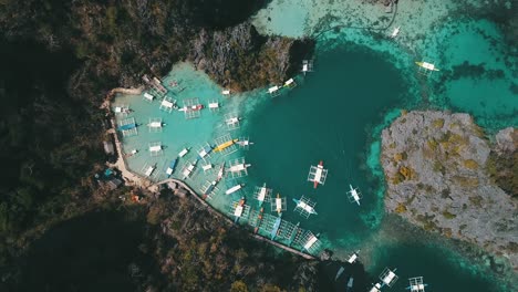 birds eye view of a philippine boat going out fo the dock