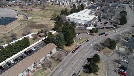 Sweeping-shot-showing-nearby-commercial-zoning-and-low-income-condominiums-in-Colorado-housing-crisis