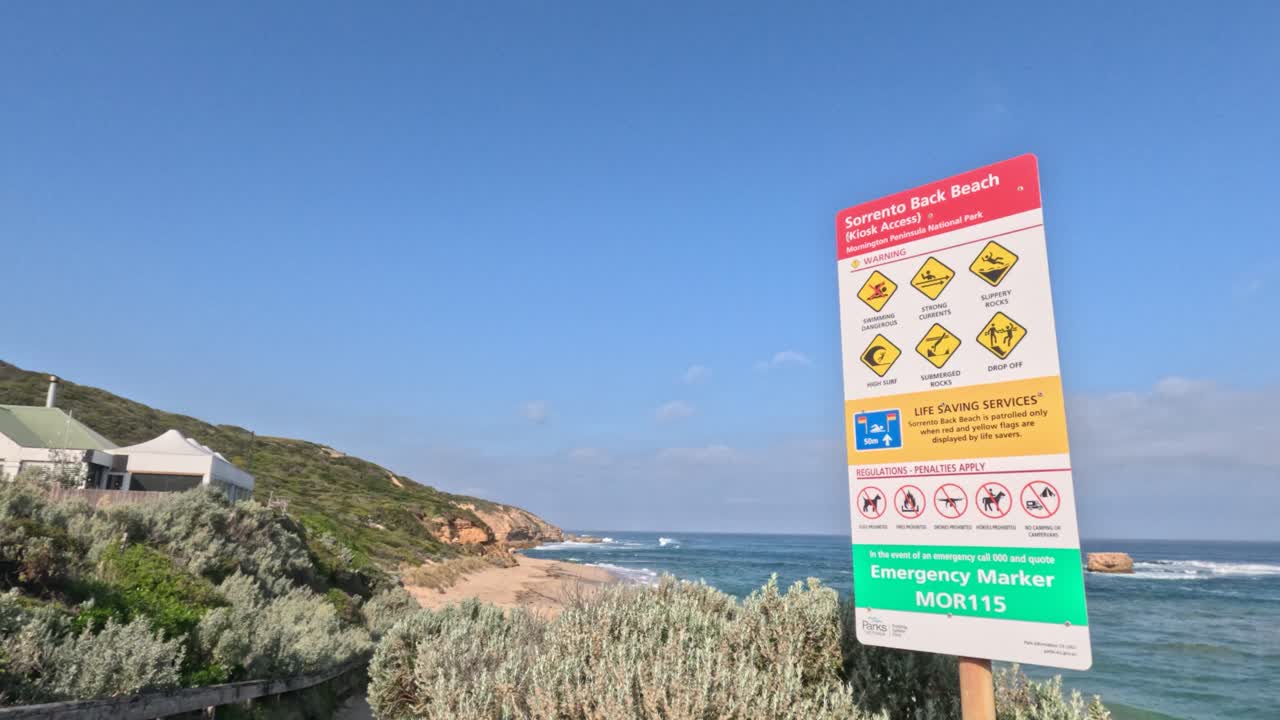 предупредительный знак на пляже сорренто, полуостров морнингтон
