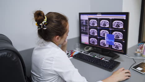 doctor reviewing ct scan images