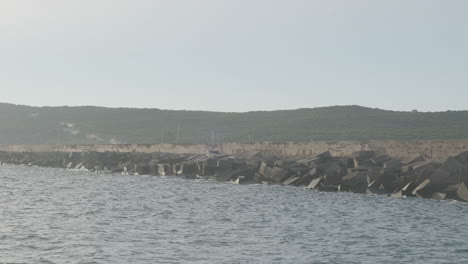 view of a breakwater from a boat