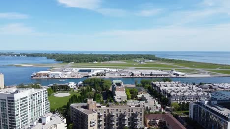 Drone-shot-of-Billy-Bishop-Toronto-City-Airport-on-a-summer-day