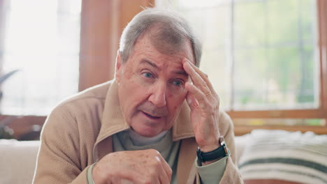 Thinking,-stress-and-senior-man-on-sofa