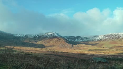 comeragh mountains waterford late evening winter sun and snow clouds over the mountains on a winter afternoon