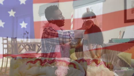 Animation-of-african-american-father-and-daughter-at-home-over-flag-of-usa