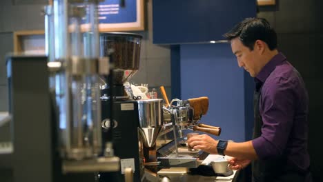 barista preparing coffee in cafe 4k