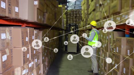 Animation-of-network-of-connections-over-caucasian-male-worker-in-warehouse