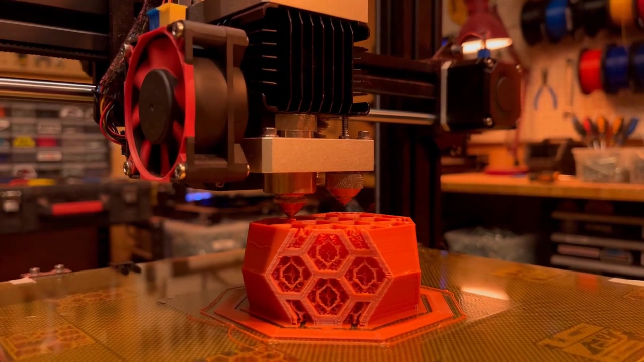 3D Printer Extruding An Orange Honeycomb Object In Warm Workshop, Modern Digital Innovation Scene