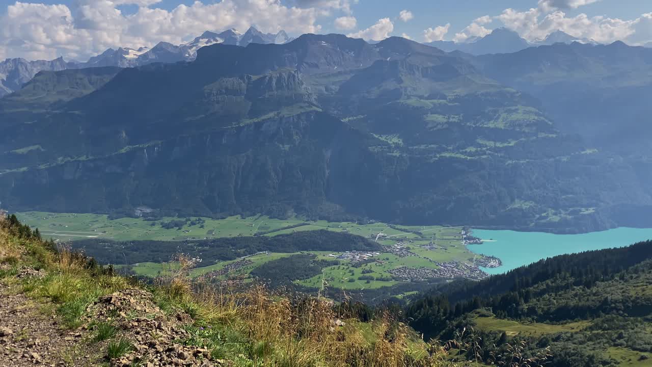 View from Eiseesattel on High Alps mountains and valley with lake, Switzerland