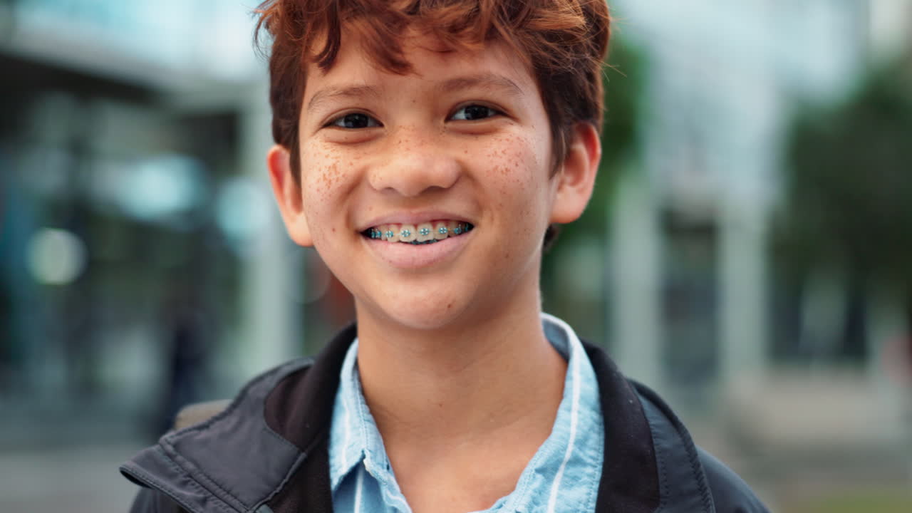Portrait of a smiling boy with braces