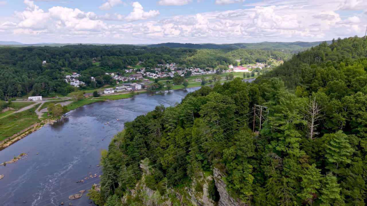 Aerial push in to Fries Virginia with new river in foreground