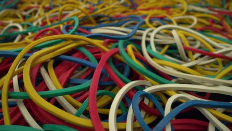 close-up colorful ring shaped rubber bands background.