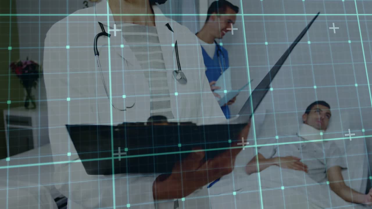 Doctor starting exam typing on laptop as nurse checking chart, blue grid overlay showing neck brace