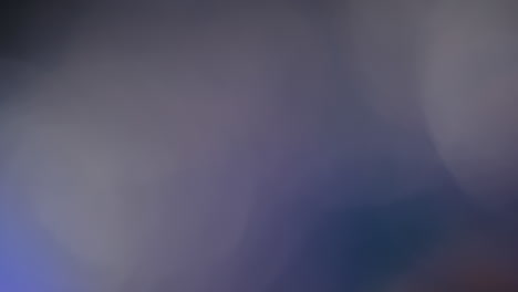 multicolored light leaks 4k footage on black background stylizing video transitions bokeh effect