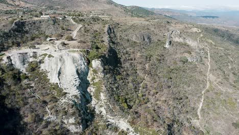 Aerial-view-of-Hierve-el-Agua,set-of-natural-travertine-rock-formations-in-San-Lorenzo-Albarradas,-Oaxaca