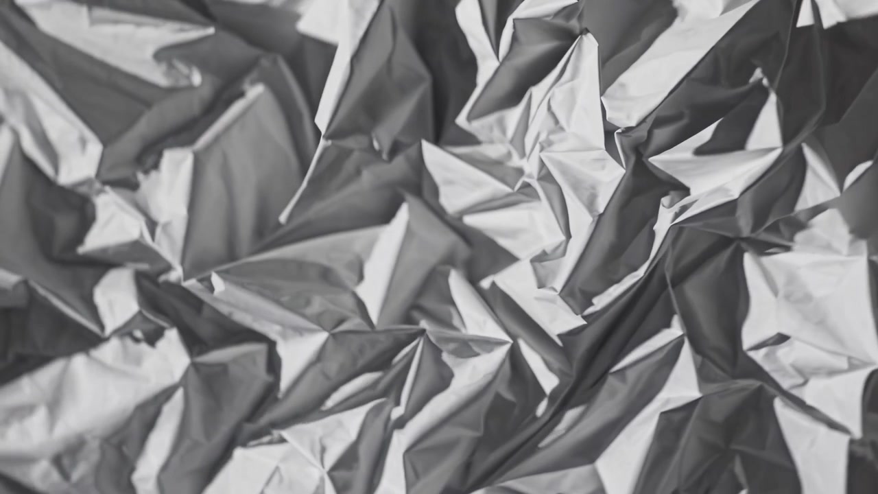 Dynamic Abstract Background of Crumpled Grey Texture
