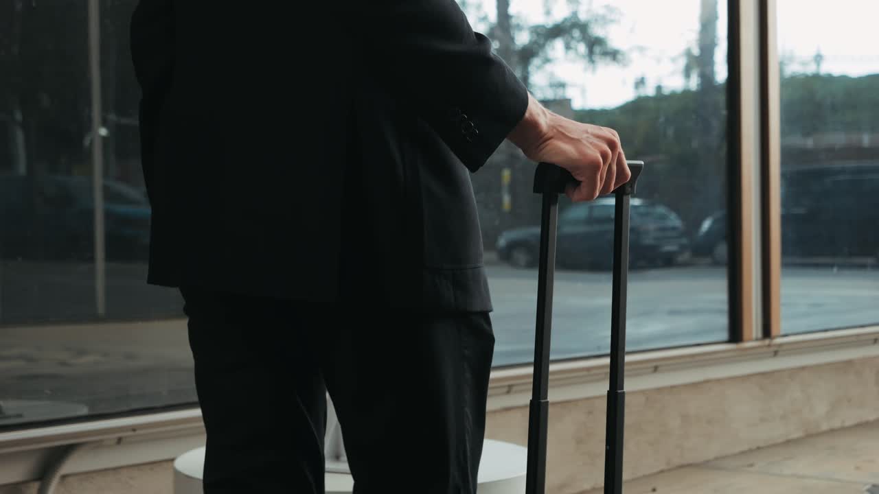 Tourist man with suitcase baggage in spain, A traveler with luggage suit jacket on business street go to a hotel, business office, airport terminal, enjoying the vibrant atmosphere