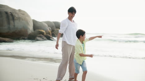 grandmother and grandson having fun on the beach