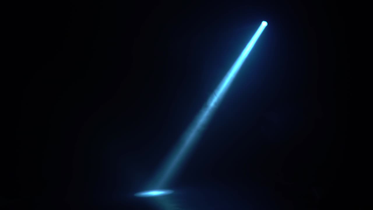 One beam from a lantern in a dark room