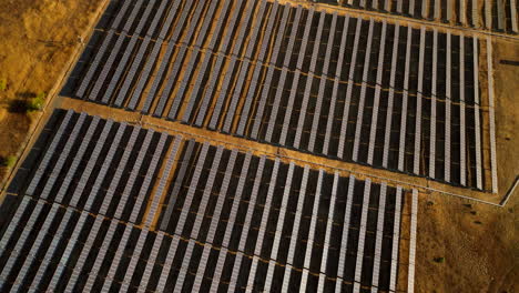 abstract aerial view over solar panels on remote solar farm in south america