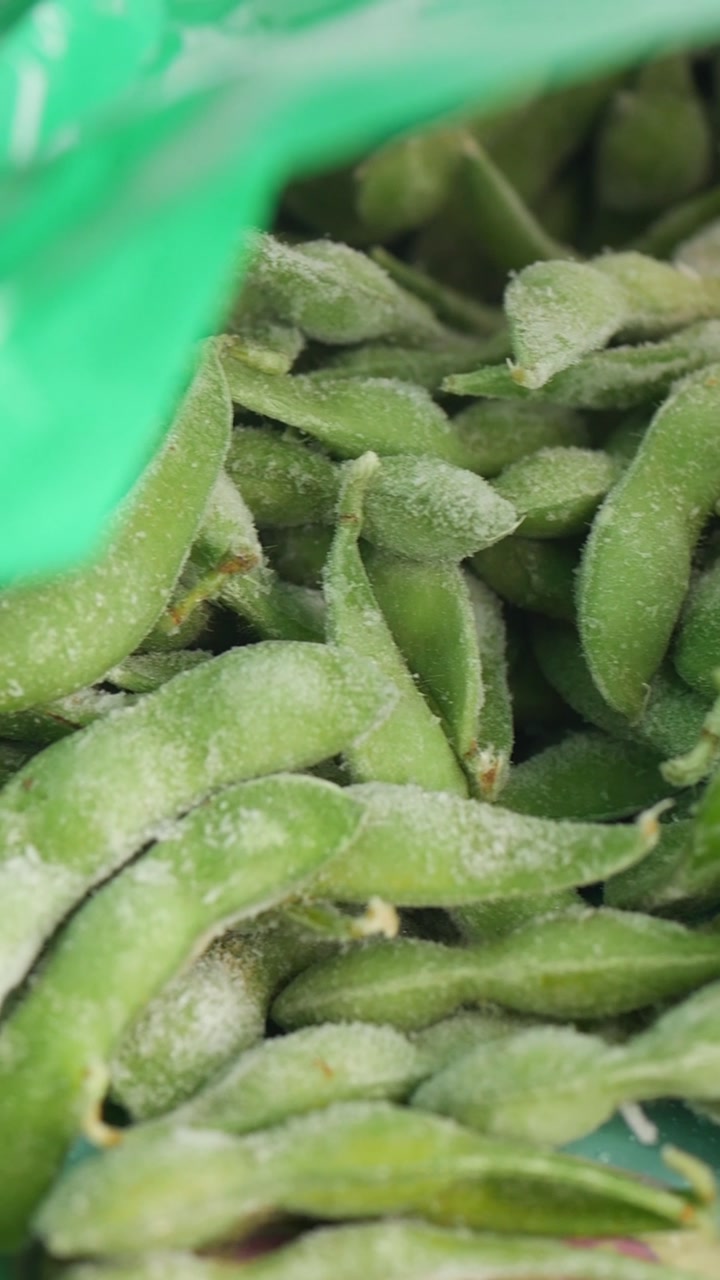 Close Up of Frozen Edamame Pods in a Bag
