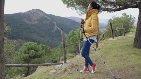 Smiling-hiker-with-poles