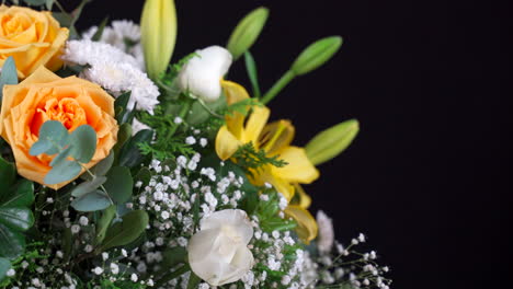 Green-and-yellow-flower-arrangement-slider-panning-roses-and-chrysanthemum