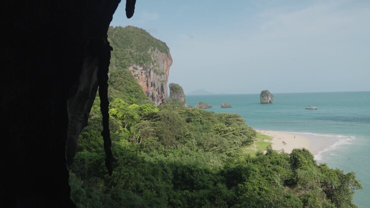 Tropical Beach with Cliffs and Rock Formations
