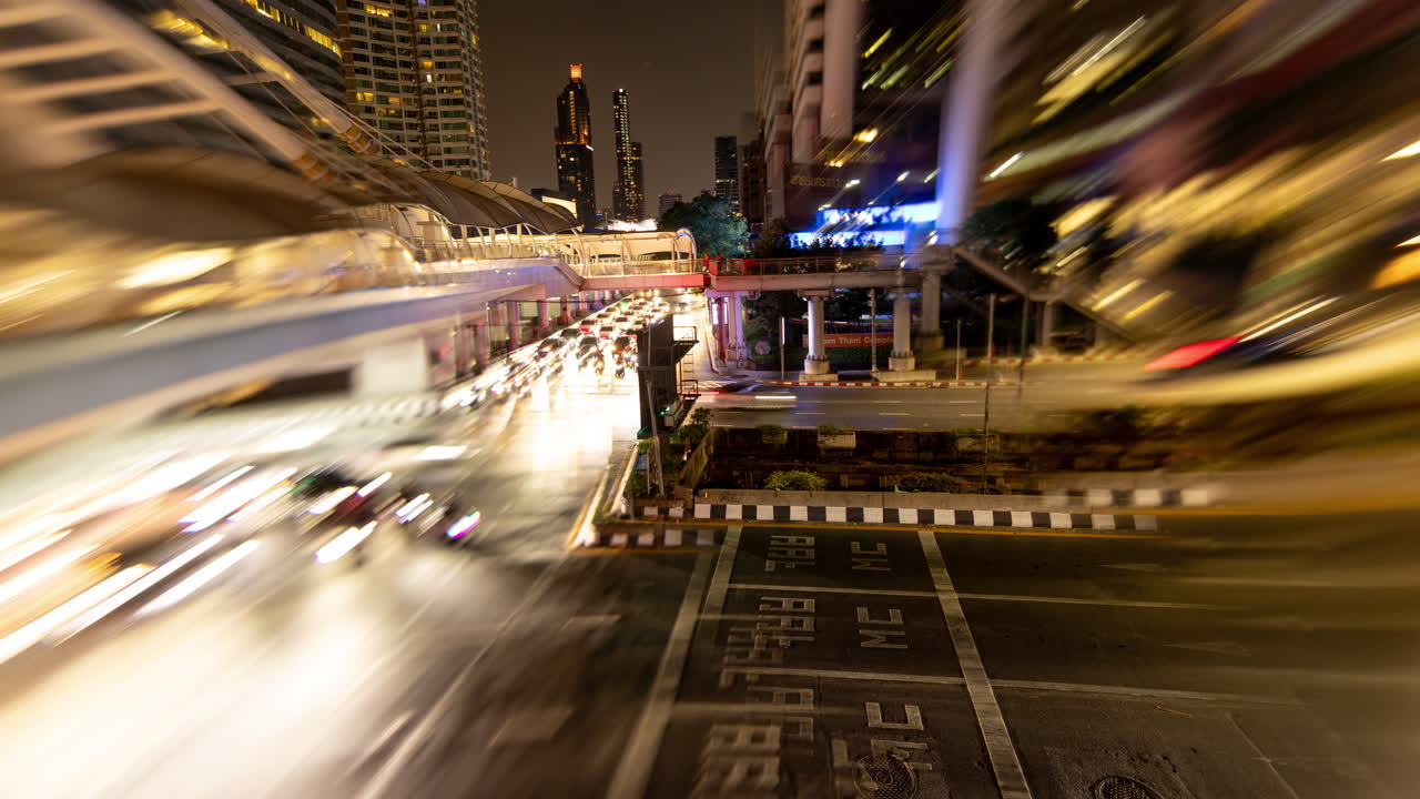 timelapse of rush hour traffic in central bangkok at night