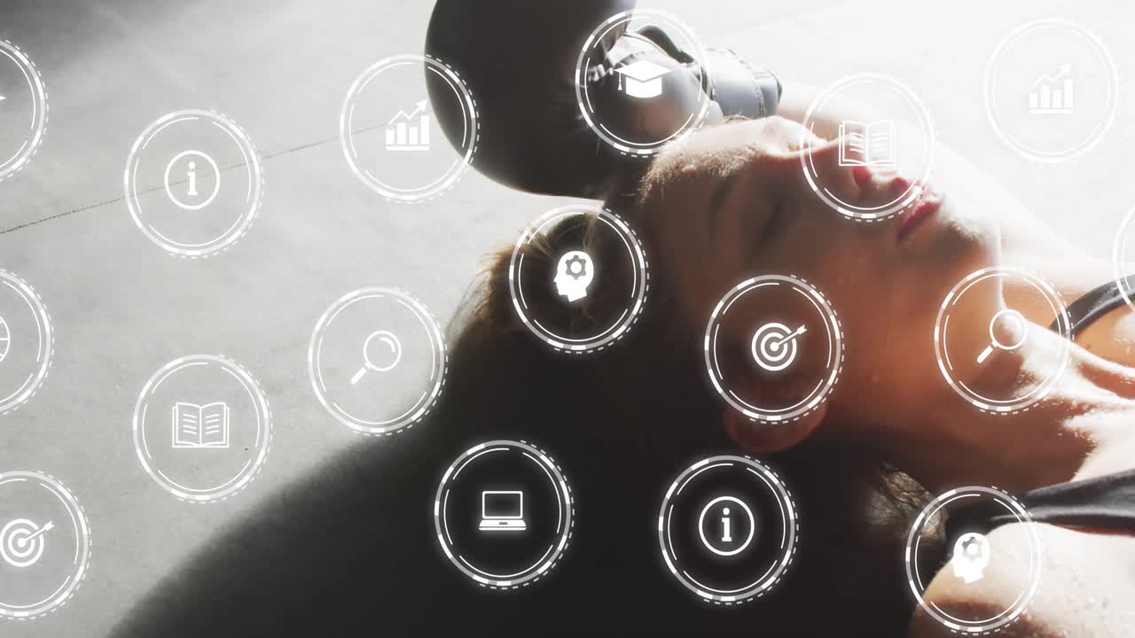 Fitness enthusiast lying supine on mat pressing dumbbell and initiating UI icons tracking data
