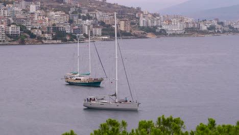 Two-sailing-ships-parked-in-Southern-European-harbor