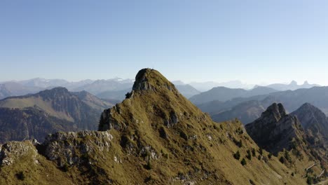 overflying summit with hikers on top