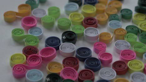 panning across bright colorful artistic quilling twists, curls, and spirals