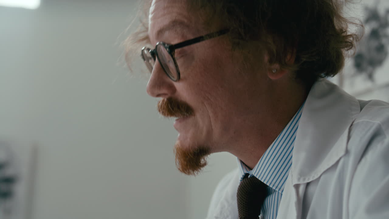 Doctor Taking Notes during Clinical Session in Psychiatric Ward