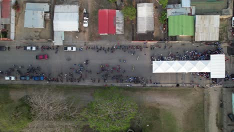 people gathered on a street in guanarito, portuguesa, venezuela, aerial view