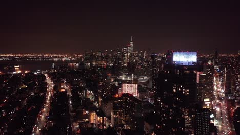 imágenes de drones nocturnos del horizonte de la ciudad de nueva york