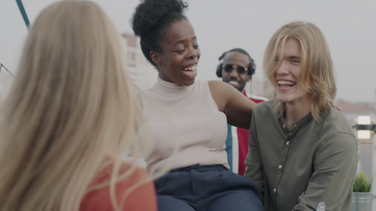 Friends Having Fun on a Rooftop