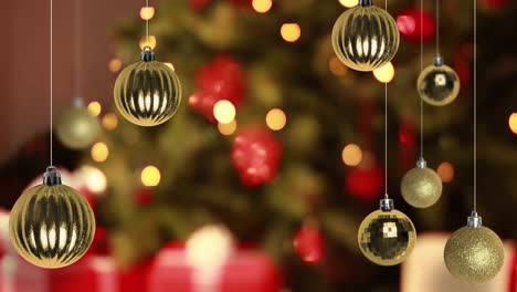 Animation-of-baubles-over-christmas-tree