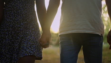 a couple holding hands
